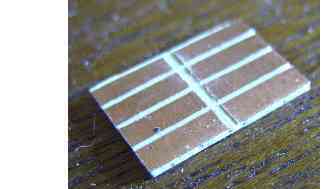 IC pad made by cutting isolated segments on a copper clad board.